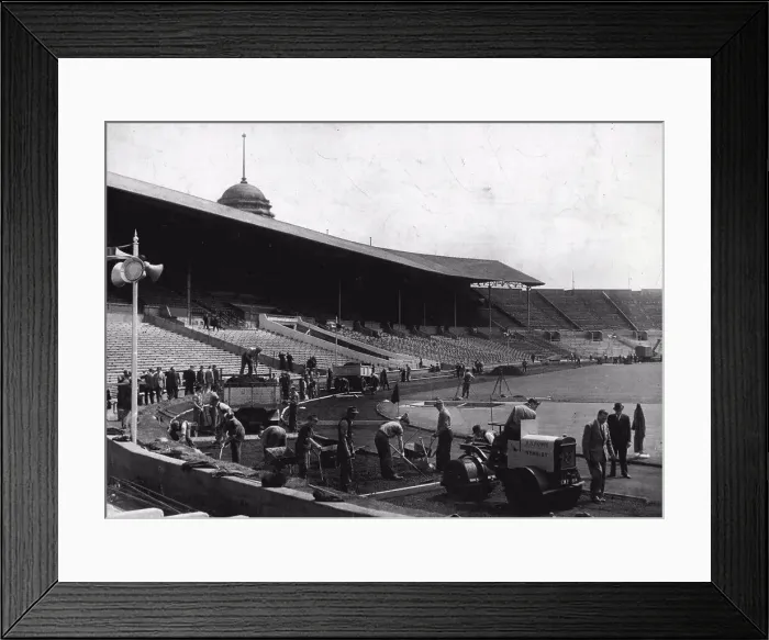 Framed Print : Olympic Change Over At Wembley Stadium : A busy scene at famous Wembley Stadium this morning