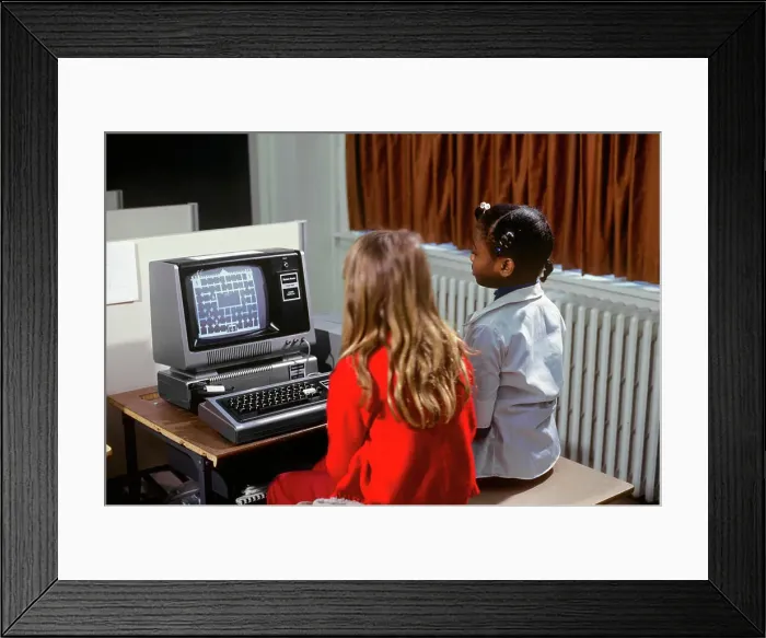 Framed Print : 1980s TWO GIRLS LEARNING ABOUT COMPUTERS BY PLAYING ON SCREEN GAME Framed Print : 1980s TWO GIRLS LEARNING ABOUT COMPUTERS BY PLAYING ON SCREEN GAME