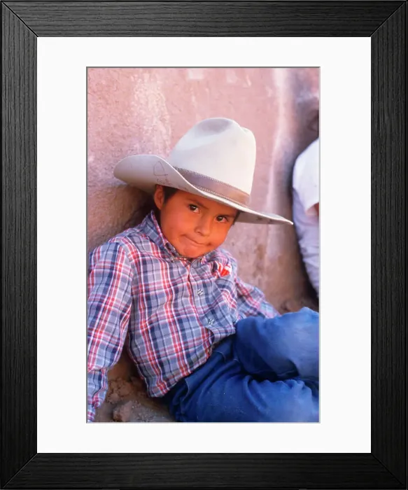 Framed Print : Young Native American cowboy lying on ground, Gallup, New Mexico Framed Print : Young Native American cowboy lying on ground, Gallup, New Mexico