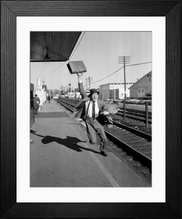 Framed Print : 1950S Businessman With Briefcase In Air Running After Departing Train