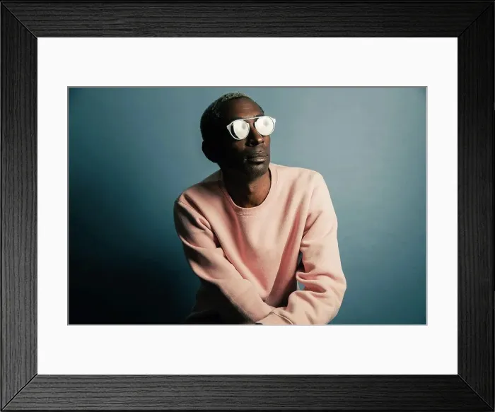 Framed Print : Black man in stylish sweatshirt