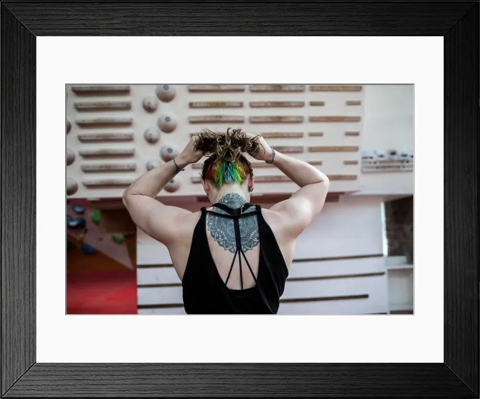 Framed Print : Young woman with mandala back tattoo at rock climbing wall Framed Print : Young woman with mandala back tattoo at rock climbing wall