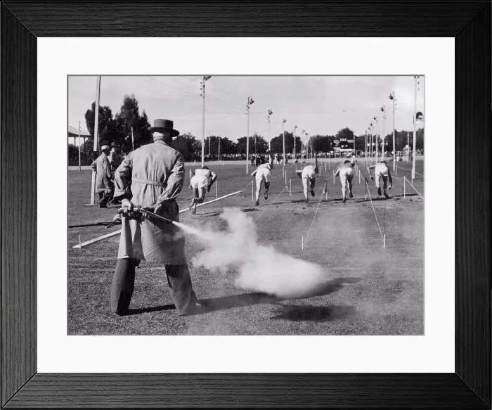 Framed Print : Shot From Behind ***** the starter's gun Framed Print : Shot From Behind ***** the starter's gun