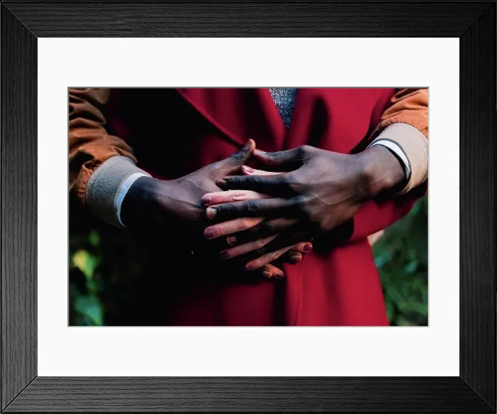 Framed Print : Close-up of couple holding hands Framed Print : Close-up of couple holding hands