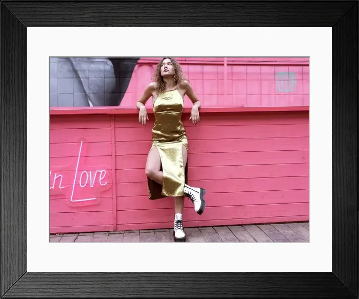 Framed Print : portrait of a beautiful fashion girl with curly hair posing on a Framed Print : portrait of a beautiful fashion girl with curly hair posing on a