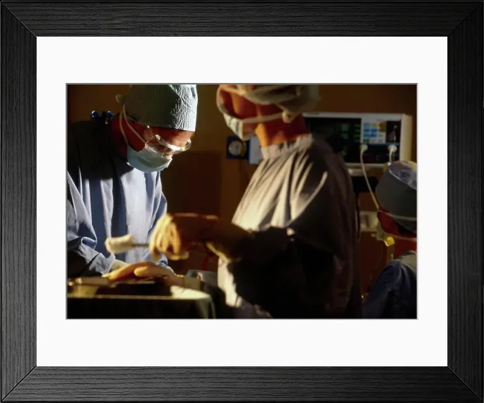 Framed Print : Nurses assisting doctor in theatre of hospital with operation Framed Print : Nurses assisting doctor in theatre of hospital with operation