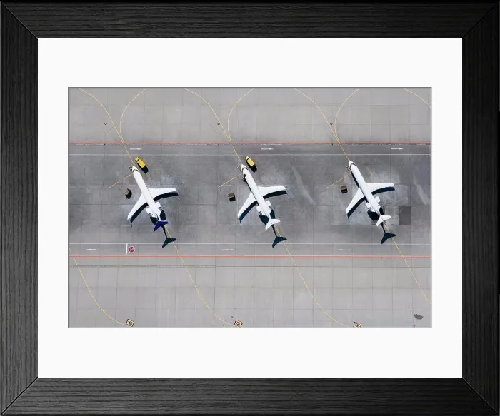 Framed Print : Aerial view of three airplanes in a row