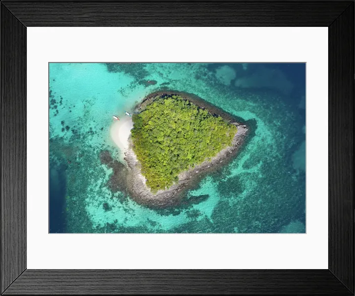Framed Print : Aerial view of boats beside small green tropical island among azure water of ocean Framed Print : Aerial view of boats beside small green tropical island among azure water of ocean