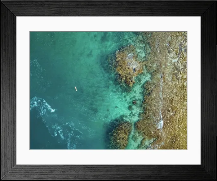 Framed Print : Aerial view of surfer, Sumbawa, Indonesia Framed Print : Aerial view of surfer, Sumbawa, Indonesia
