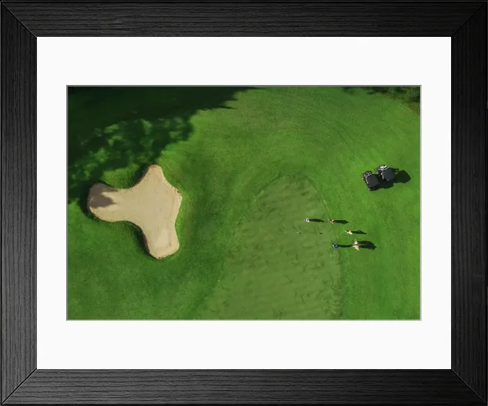 Framed Print : Aerial view of players at golf field Framed Print : Aerial view of players at golf field