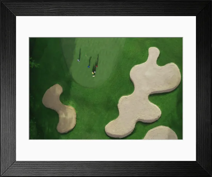 Framed Print : Aerial view of players at golf field