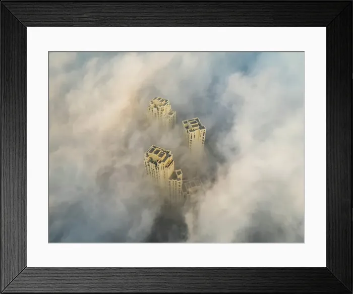 Framed Print : Aerial view of skyscrapers in the clouds of Dubai, U.A.E Framed Print : Aerial view of skyscrapers in the clouds of Dubai, U.A.E