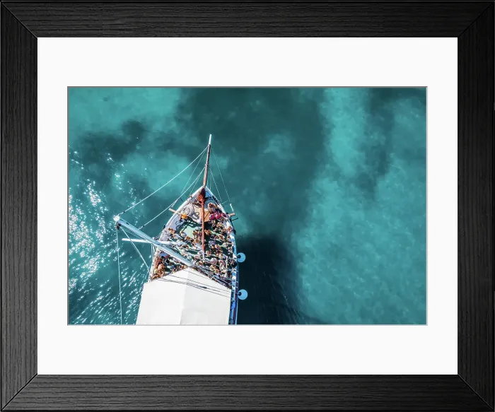 Framed Print : Tisno, Croatia - 9AUGUST 2019: Aerial view of a boat in the turquoise waters Framed Print : Tisno, Croatia - 9AUGUST 2019: Aerial view of a boat in the turquoise waters