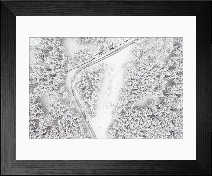 Framed Print : Aerial view on the road and forest at the winter time. Snowy forest, natural winter landscape