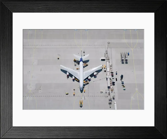 Framed Print : Aerial view of airplane on tarmac Framed Print : Aerial view of airplane on tarmac