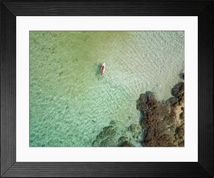 Framed Print : Aerial view of female surfer, Sumbawa, Indonesia Framed Print : Aerial view of female surfer, Sumbawa, Indonesia