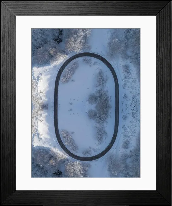 Framed Print : extreme high mountain road snowy from aerial view