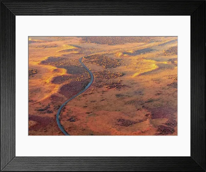 Framed Print : Australia, Northern Territory, Aerial view of winding road in Uluru-Kata Tjuta National Park Framed Print : Australia, Northern Territory, Aerial view of winding road in Uluru-Kata Tjuta National Park