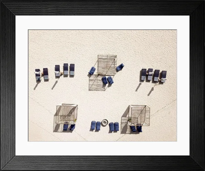 Framed Print : Aerial view of canopies and empty deck chairs on sandy beach Framed Print : Aerial view of canopies and empty deck chairs on sandy beach