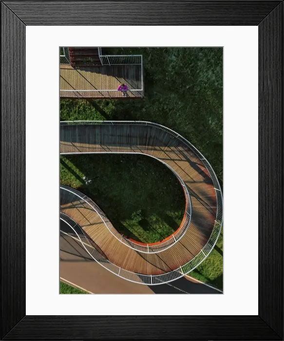 Framed Print : Russia, Aerial view of woman standing on winding boardwalk Framed Print : Russia, Aerial view of woman standing on winding boardwalk