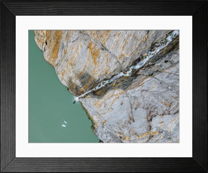 Framed Print : Aerial top down view of a zodiac with tourist viewing Misty Fjords waterfall in Misty Fjords National Monument Framed Print : Aerial top down view of a zodiac with tourist viewing Misty Fjords waterfall in Misty Fjords National Monument