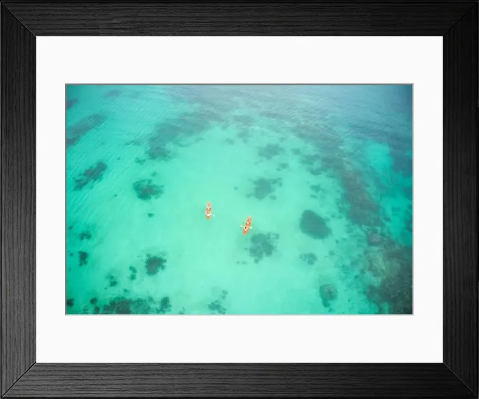 Framed Print : Aerial boat and people in ocean for kayak adventure Framed Print : Aerial boat and people in ocean for kayak adventure