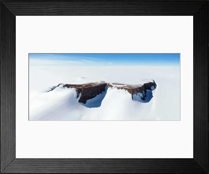 Framed Print : Panoramic aerial view of the SANAE IV base on a mountain surrounded by snow in Antarctica Framed Print : Panoramic aerial view of the SANAE IV base on a mountain surrounded by snow in Antarctica