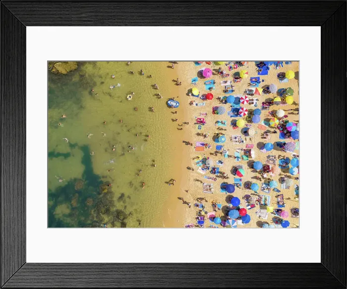 Framed Print : Aerial view above of people enjoying the summer at Praia do Camilo, Portugal Framed Print : Aerial view above of people enjoying the summer at Praia do Camilo, Portugal
