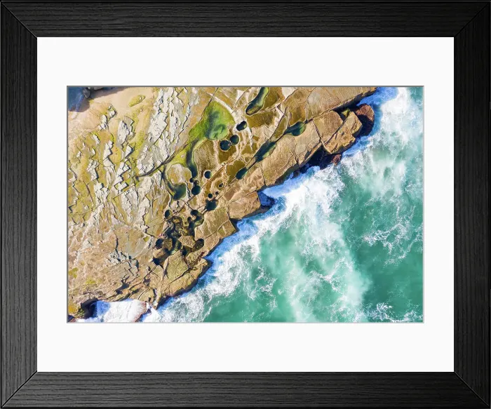 Framed Print : Aerial view above dangerous rock shelf in Sydney's Royal National Park, Australia Framed Print : Aerial view above dangerous rock shelf in Sydney's Royal National Park, Australia