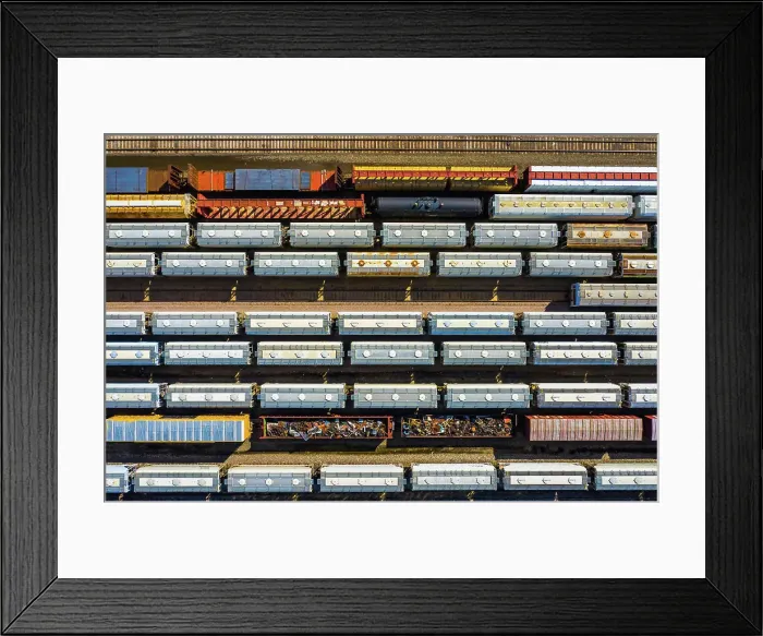 Framed Print : Aerial view of rail cars waiting at a staging railyard station in Aurora, IL - USA Framed Print : Aerial view of rail cars waiting at a staging railyard station in Aurora, IL - USA