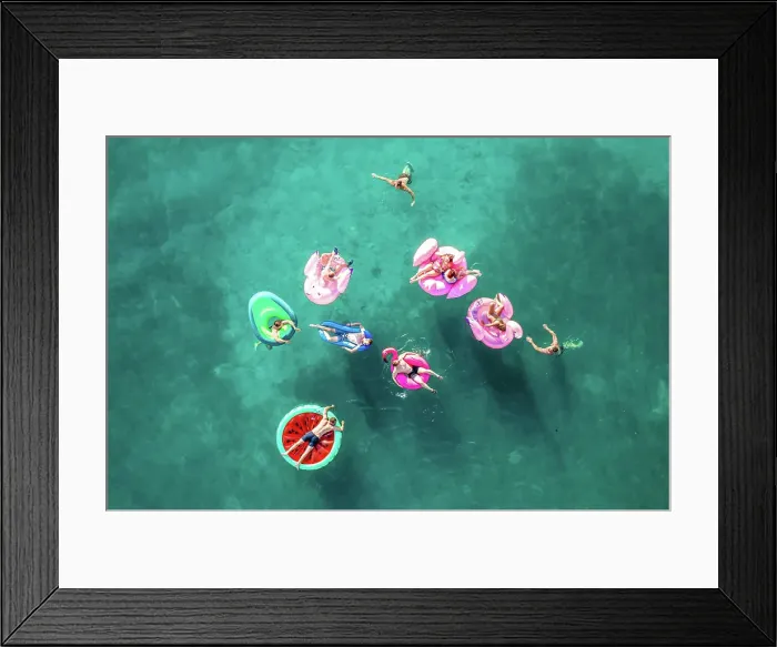 Framed Print : Tisno, Croatia - 9AUGUST 2019: Aerial view of people floating in the turquoise waters Framed Print : Tisno, Croatia - 9AUGUST 2019: Aerial view of people floating in the turquoise waters