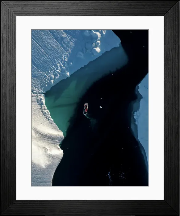 Framed Print : Aerial top-down drone view a red boat driving between icebergs, Ilulissat, Greenland, Arctic Framed Print : Aerial top-down drone view a red boat driving between icebergs, Ilulissat, Greenland, Arctic