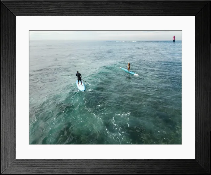 Framed Print : Aerial view of sup surfers