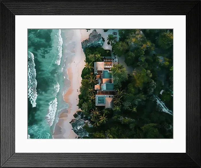 Framed Print : Aerial view of a secluded tropical villa with a thatched roof and pool by a sandy beach Framed Print : Aerial view of a secluded tropical villa with a thatched roof and pool by a sandy beach