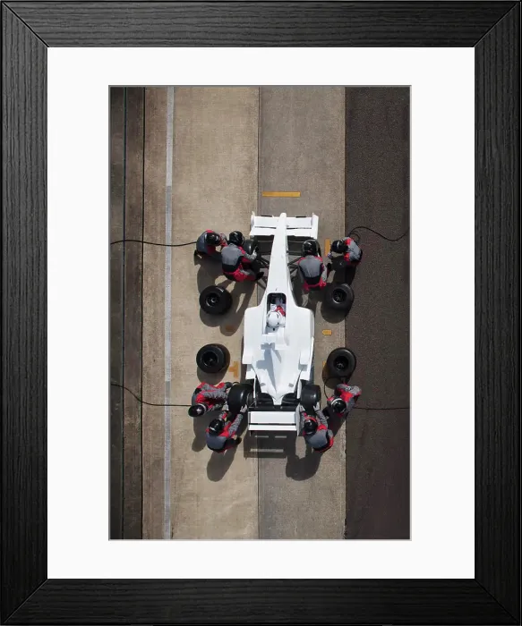 Framed Print : Aerial view of a pit stop team in action during a motorsport race Framed Print : Aerial view of a pit stop team in action during a motorsport race