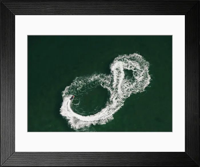 Framed Print : Aerial view of jet skier making figure of eight at sea, Melbourne, Victoria, Australia Framed Print : Aerial view of jet skier making figure of eight at sea, Melbourne, Victoria, Australia
