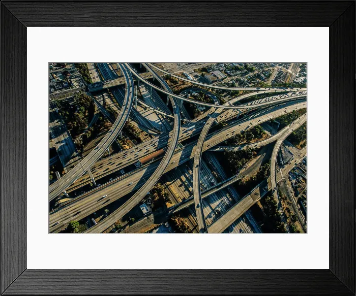 Framed Print : Aerial view of complex curved flyovers and highways, Los Angeles, California, USA Framed Print : Aerial view of complex curved flyovers and highways, Los Angeles, California, USA