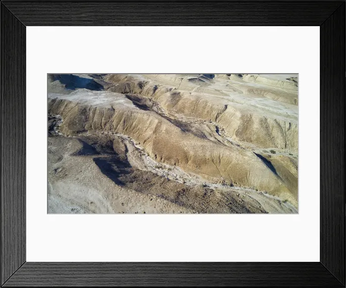 Framed Print : Eroded sandstone mountains on sea shore, Dead Sea, Israel. Aerial photography with drone Framed Print : Eroded sandstone mountains on sea shore, Dead Sea, Israel. Aerial photography with drone