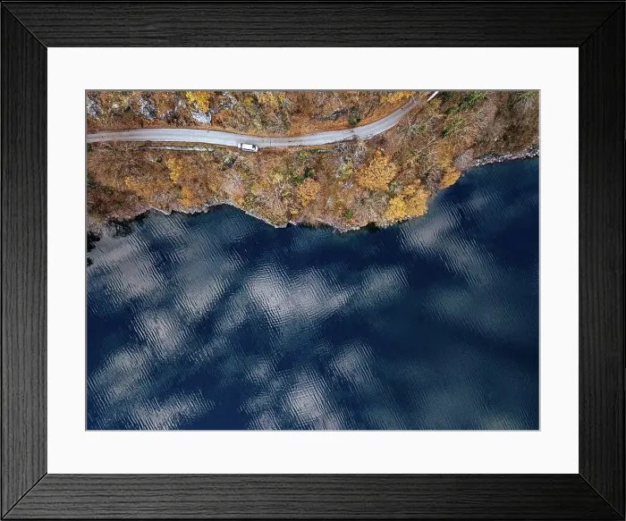 Framed Print : Aerial view of country road stretching along shore of Lake¶ÿRitsa¶ÿin autumn Framed Print : Aerial view of country road stretching along shore of Lake¶ÿRitsa¶ÿin autumn