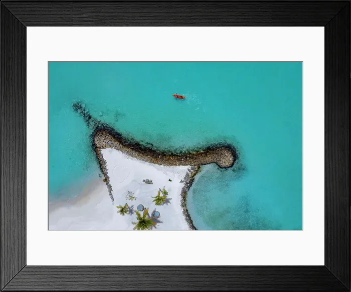 Framed Print : Aerial view of kayakers at sunny day, Maldives Framed Print : Aerial view of kayakers at sunny day, Maldives