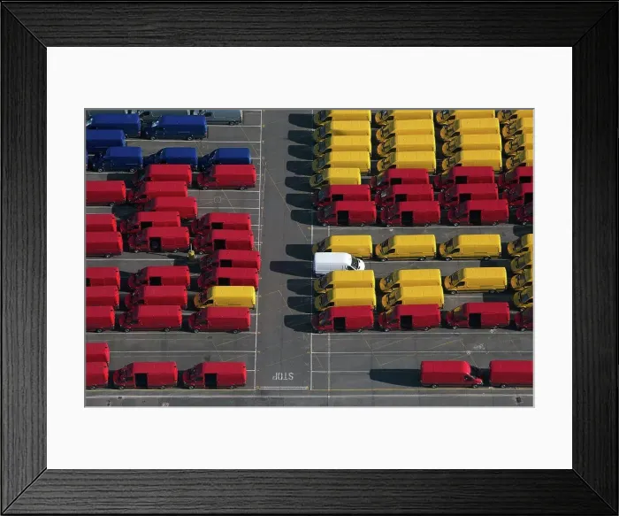 Framed Print : UK, Essex, Purfleet Docks, Aerial view of rows of colorful vans