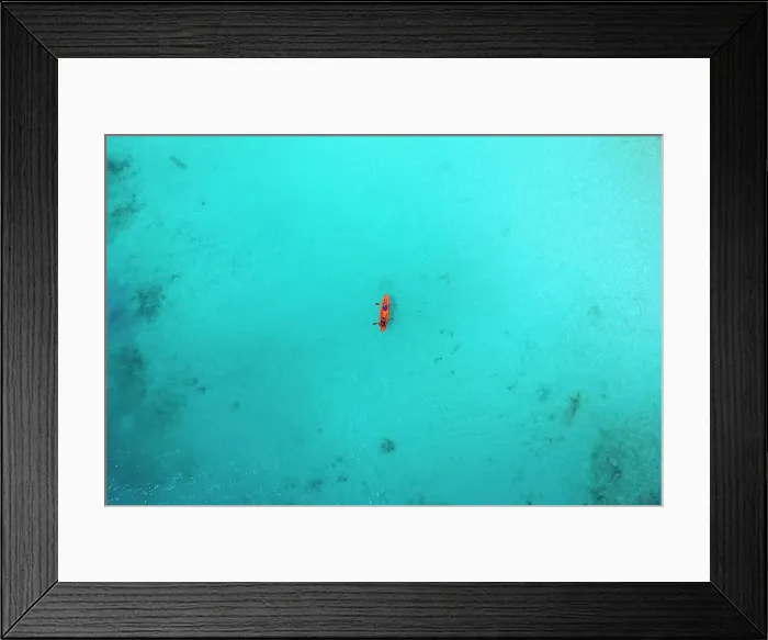 Framed Print : Aerial view of kayakers at sunny day, Maldives Framed Print : Aerial view of kayakers at sunny day, Maldives