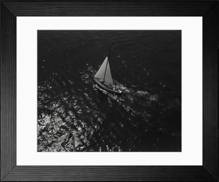 Framed Print : Vintage Photograph. Aerial view of sailboat sailing in the moonlight Framed Print : Vintage Photograph. Aerial view of sailboat sailing in the moonlight
