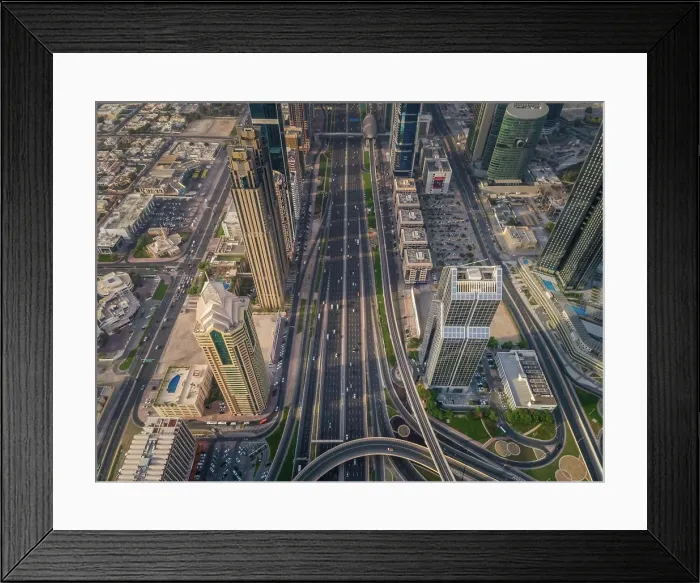Framed Print : Aerial view of the traffic lanes and Skyscrapers in Dubai, U.A.E Framed Print : Aerial view of the traffic lanes and Skyscrapers in Dubai, U.A.E