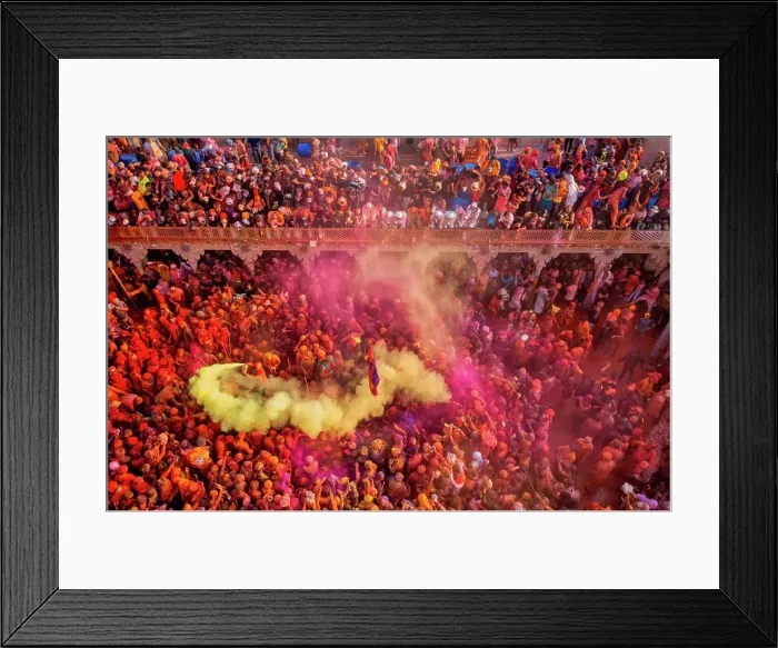 Framed Print : Nandgaon, India - 01 March 2023: Aerial view of people celebrating the holy colour festival at Shri And Baba Temple Framed Print : Nandgaon, India - 01 March 2023: Aerial view of people celebrating the holy colour festival at Shri And Baba Temple
