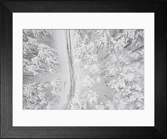 Framed Print : Aerial view on the road and forest at the winter time. Snowy forest, natural winter landscape