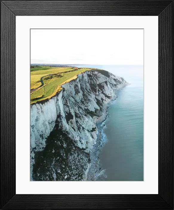 Framed Print : Aerial drone view of the Seven Sisters Cliffs National Park during sunset in the Eastbourne, England, United Kingdom Framed Print : Aerial drone view of the Seven Sisters Cliffs National Park during sunset in the Eastbourne, England, United Kingdom