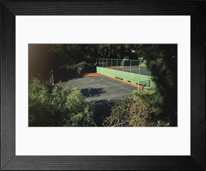 Framed Print : Drone, aerial view of basketball court and basketball player man preparing for training match Framed Print : Drone, aerial view of basketball court and basketball player man preparing for training match
