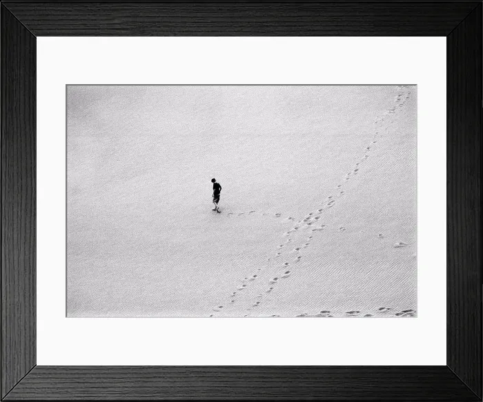 Framed Print : Aerial View of Boy Walking Across Sand Dune Framed Print : Aerial View of Boy Walking Across Sand Dune