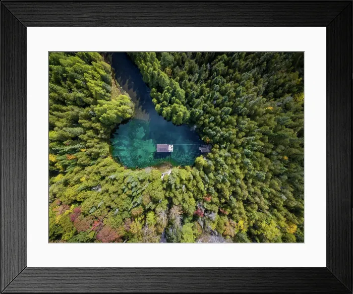 Framed Print : Aerial view of house on Kitch-iti-kipi lake also called The Big Spring, Michigan, USA Framed Print : Aerial view of house on Kitch-iti-kipi lake also called The Big Spring, Michigan, USA